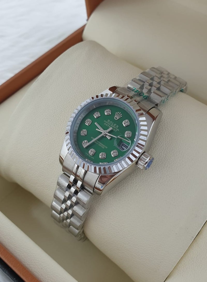 Rolex Women's watch with light green dial 