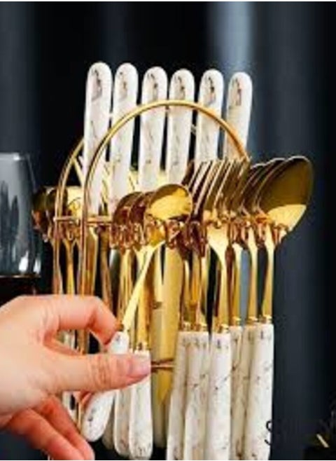 A set of 24-piece marble spoons with a golden stand, white marble color