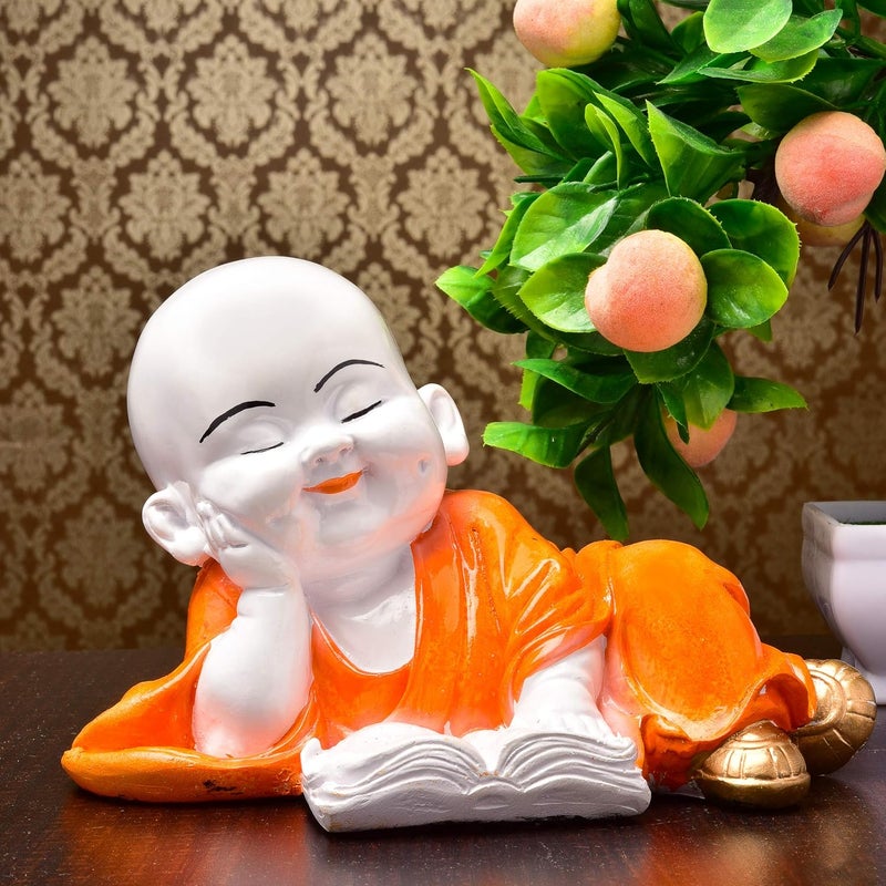 Karigaari India Handcrafted Baby Laughing Buddha Reading Book Showpiece for Home Decor - Image 1