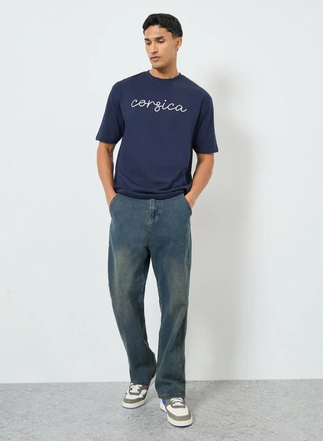 Styli Men Oversized Crew Neck Slogan T-Shirt