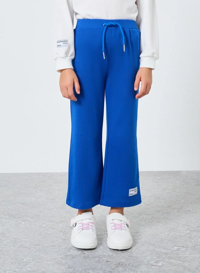 Styli Styli Girls Central Park Print Sweatshirt and Trousers Set