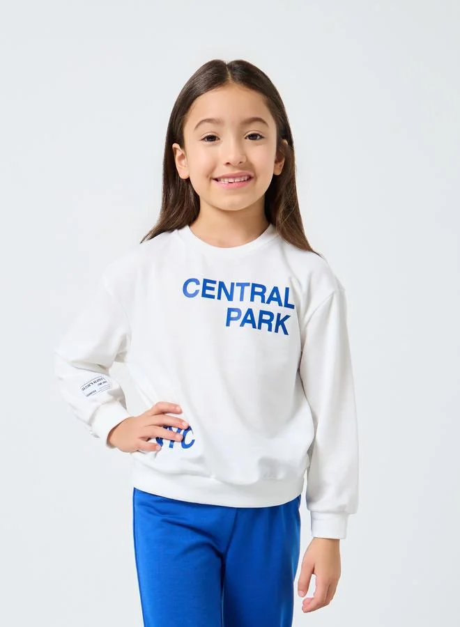 Styli Styli Girls Central Park Print Sweatshirt and Trousers Set