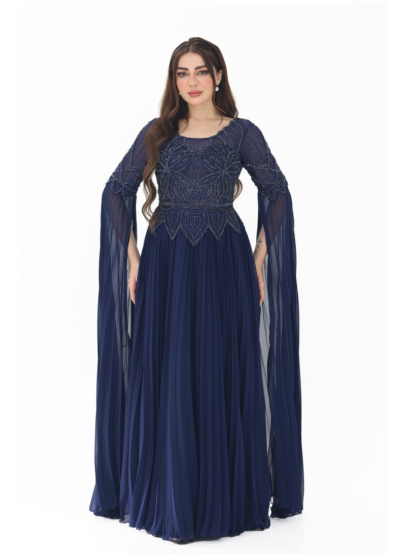 مودرن ديزاين فستان سهره فخم شيفون بتطريز يدوي انيق على كافة الصدر والظهر والاكتاف من خامة الشيفون الفاخر يتميز الفستان بتقليم بيليسيه سيمنحك إطلالة فخمة ومميزة في المناسبات الخاصة. يعكس التصميم العام والتفاصيل ال - Image 1