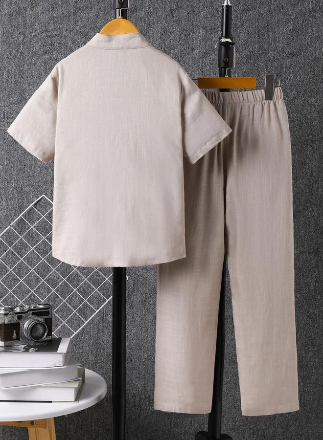 تايك تو مجموعة من بنطال وقميص بمظهر الكتان