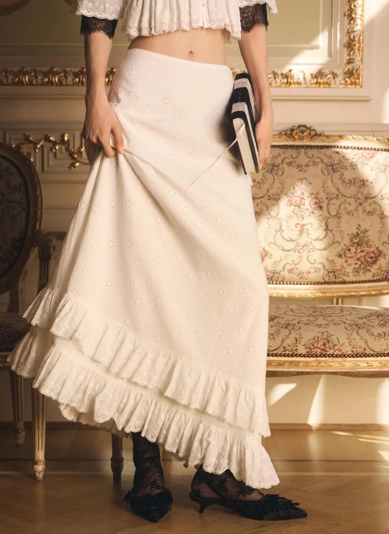 Cotton maxi skirt with ruffles and a floral pattern
