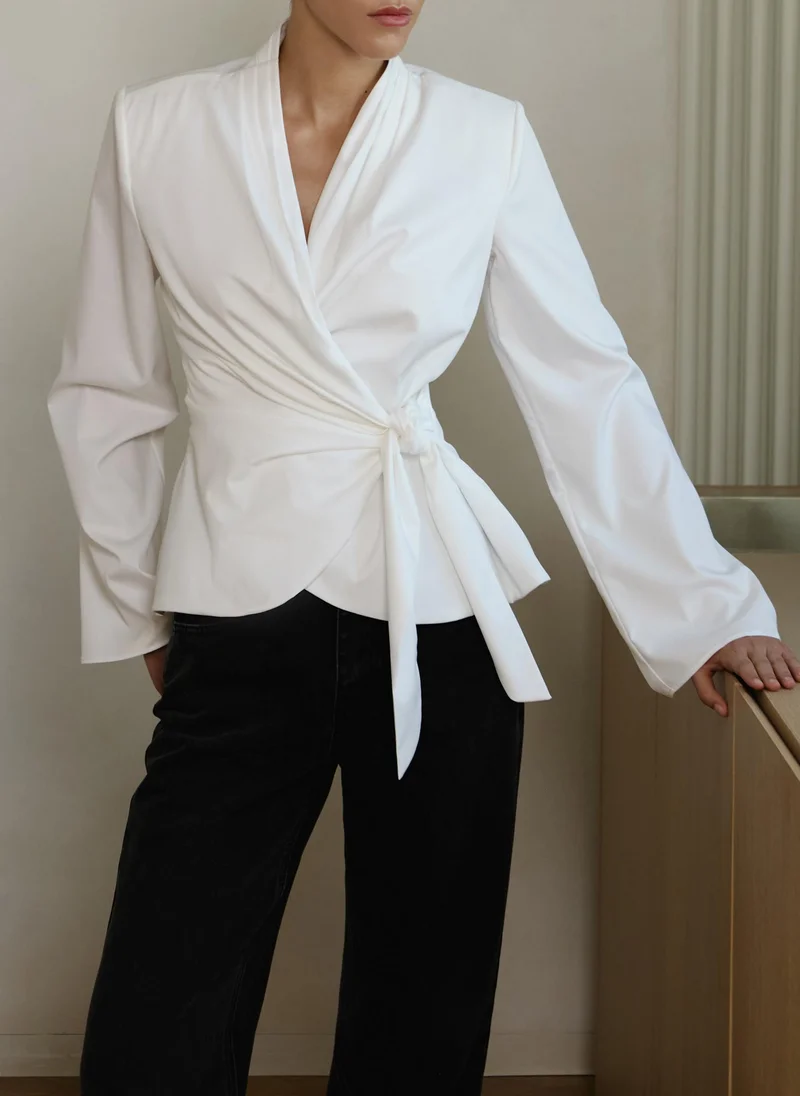 Lichi Flared blouse with waist ribbons