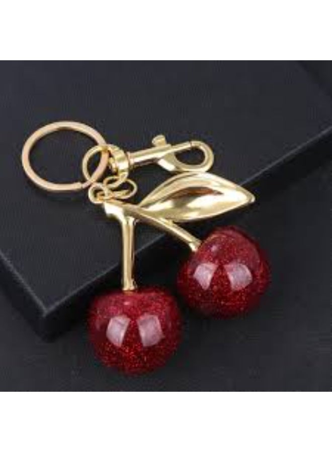 An elegant, fruity cherry-shaped medallion with a sophisticated and distinctive design — perfect for everyday decoration and a modern touch to travel and outdoor accessories! - Image 1