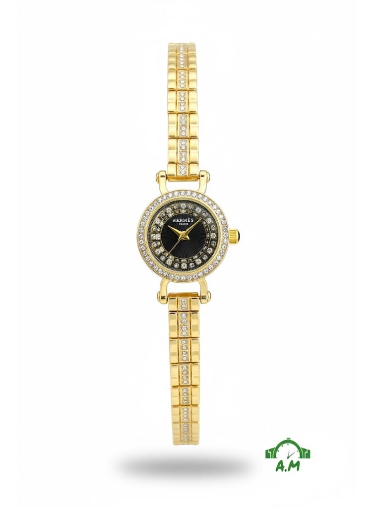 هيرميس ساعة هيرميس باريس النسائية من الفولاذ المقاوم للصدأ باللون الذهبي مع مينا أسود وإطار مرصع بالكريستال