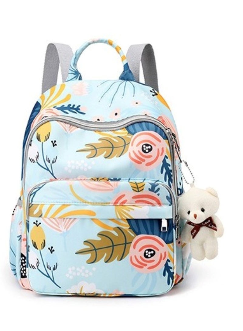 هويتك حقيبة سفر للأمهات بطبعات الأزهار باللون الأزرق - Image 1