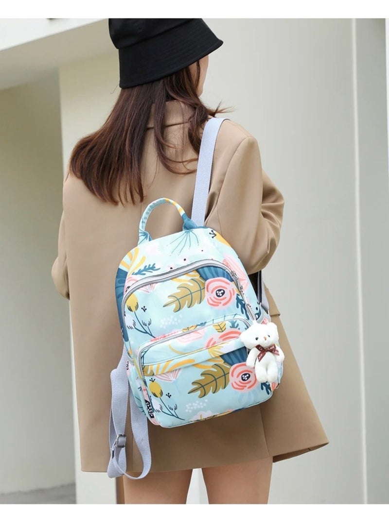 هويتك حقيبة سفر للأمهات بطبعات الأزهار باللون الأزرق - Image 3