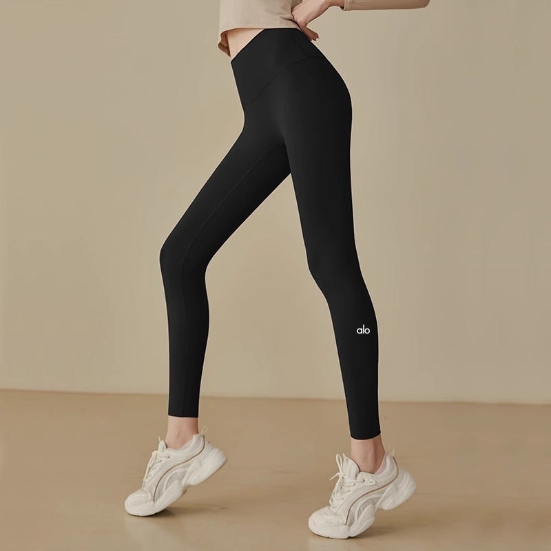 Alo Yoga High Waist Peach Butt Seamless Yoga Pants for Running and Fitness - Image 1