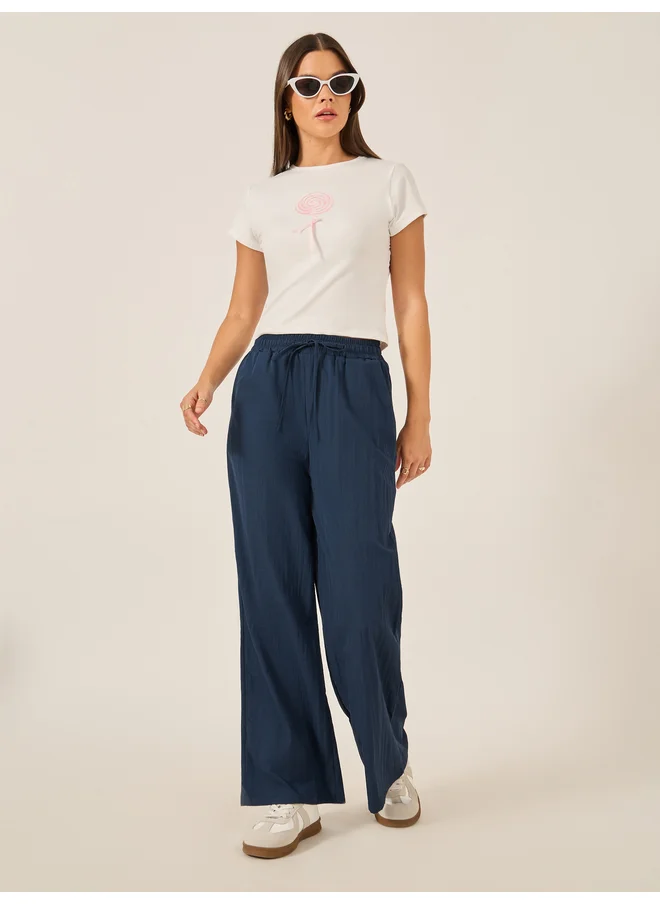 Styli Styli Plain Drawstring Waist Wide Leg Pants