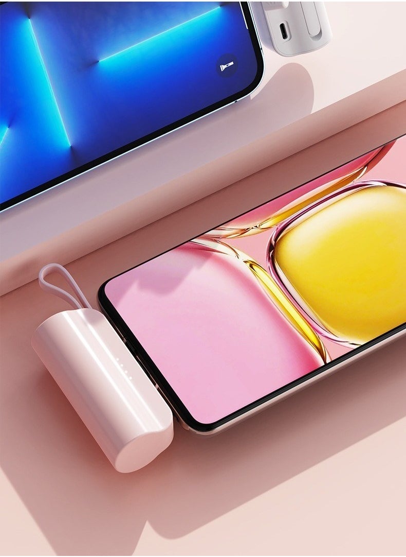 Generic - 10000 mAh large capacity capsule power bank Typec plug and Apple cable dual plug with built-in mobile phone holder portable multi-functional power bank pink - Image 1
