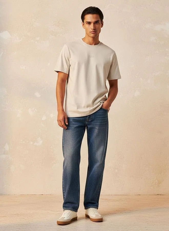 Lee Cooper Cream Lee Cooper Regular Fit Crew Neck Short Sleeves Logo Print T-shirt for Men | Best Price UAE