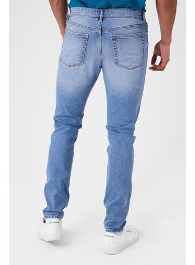 FOREVER 21 بنطال جينز سكيني بنمط ستون ووش  - Image 4