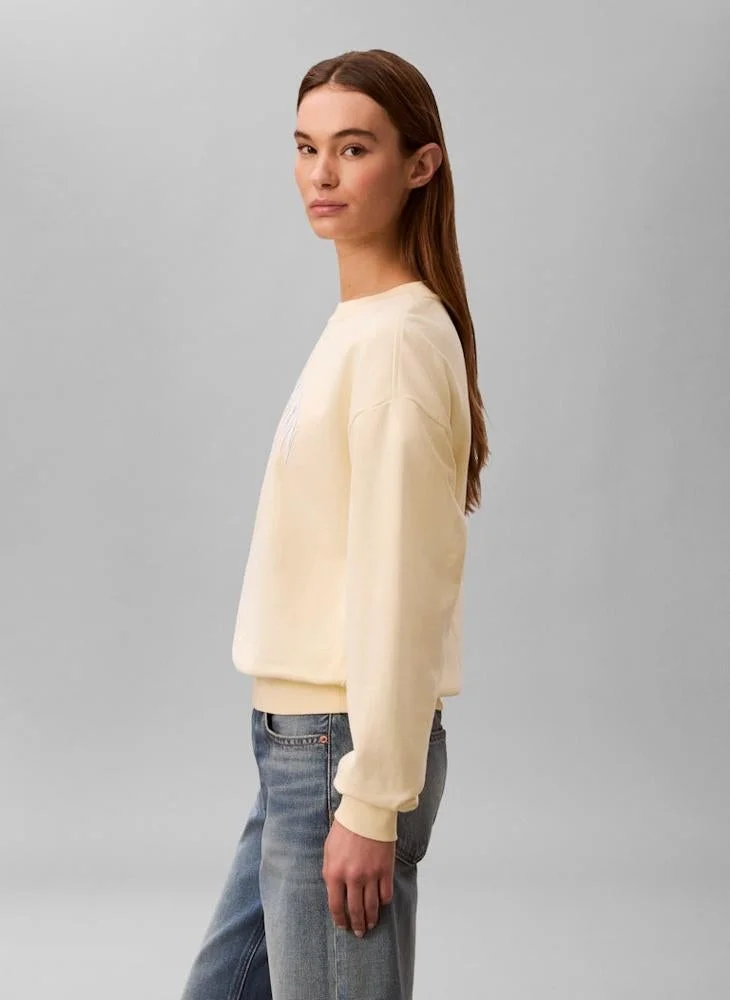 Calvin Klein Jeans  Logo Graphic Crew Neck Sweatshirt for Women | Best Price UAE