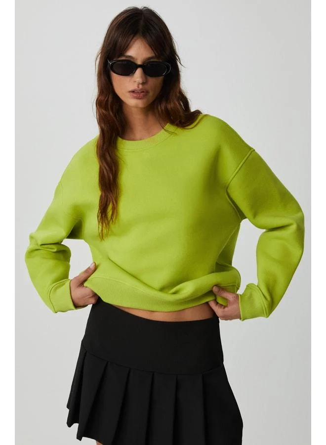 Grimelange VANELTINA Women's Long Sleeve 3-Ply Organic Cotton Oversize Basic Crew Neck Pistachio Green Sweatshirt.