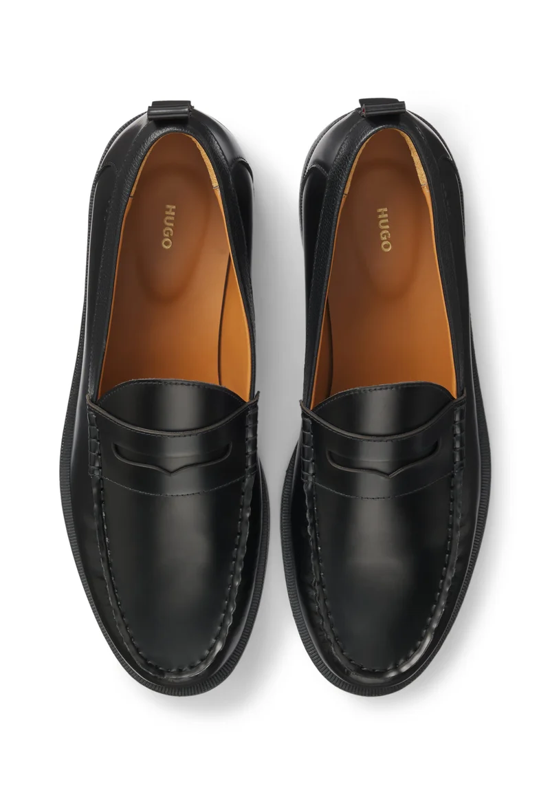 HUGO Black Penny loafers in brush-off leather for Men | Best Price UAE