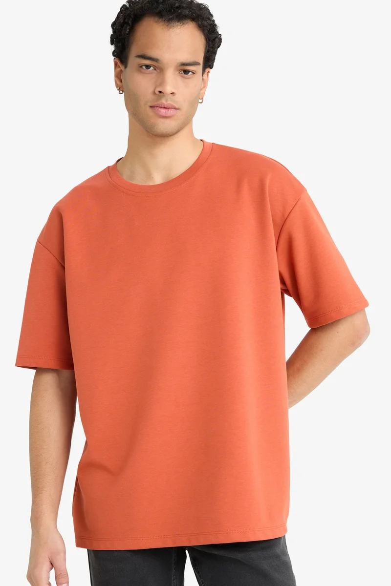ديفاكتو Oversize Crew Neck Short Sleeve T-Shirt