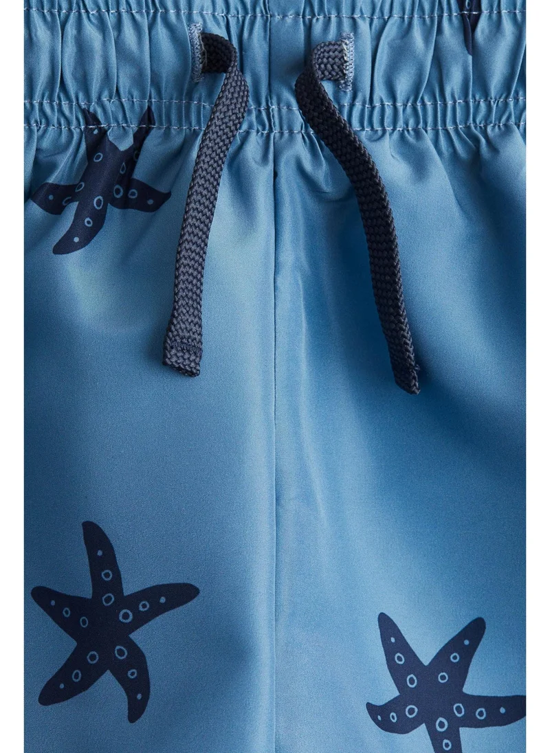 اتش اند ام Printed swim shorts