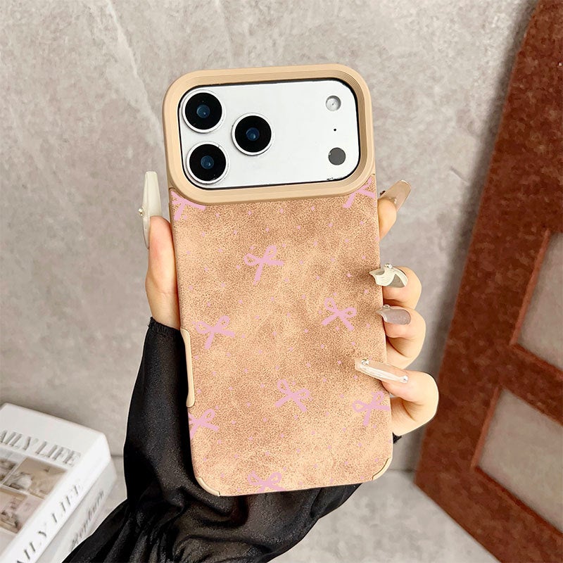 جراب هاتف Apple iPhone 17 Pro Max بتصميم أنيق ومبتكر على شكل فيونكة منقطة باللون الوردي لحماية الهاتف من الصدمات - Image 1