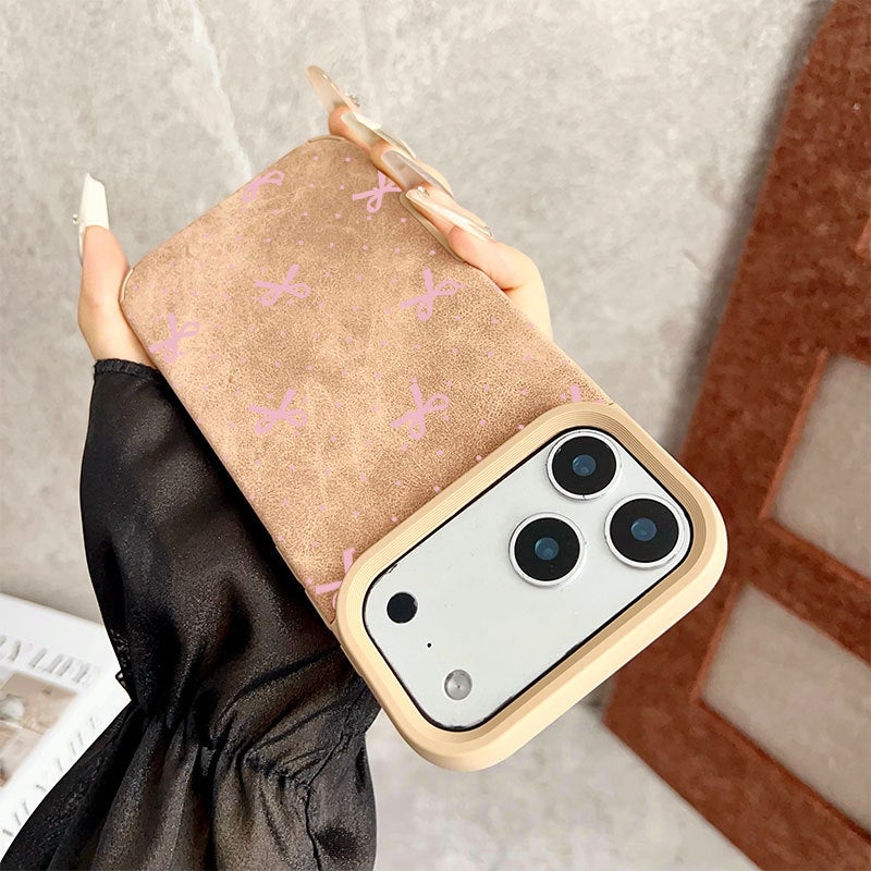 جراب هاتف Apple iPhone 17 Pro Max بتصميم أنيق ومبتكر على شكل فيونكة منقطة باللون الوردي لحماية الهاتف من الصدمات - Image 2