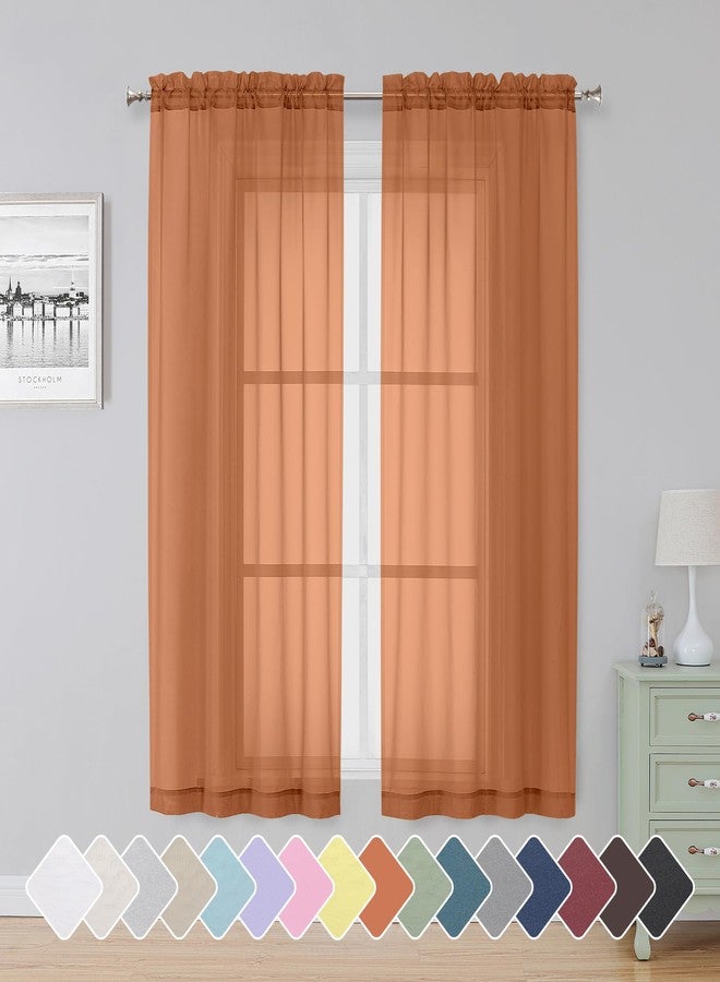 Simplebrand Orange Sheer Curtains 63 Inch Length 2 Panels, Rod Pocket Solid Color Window Sheer Curtain Panels, Elegant Curtains & Drapes for Living Room, Bedroom (42" W x 63" L) - Image 1