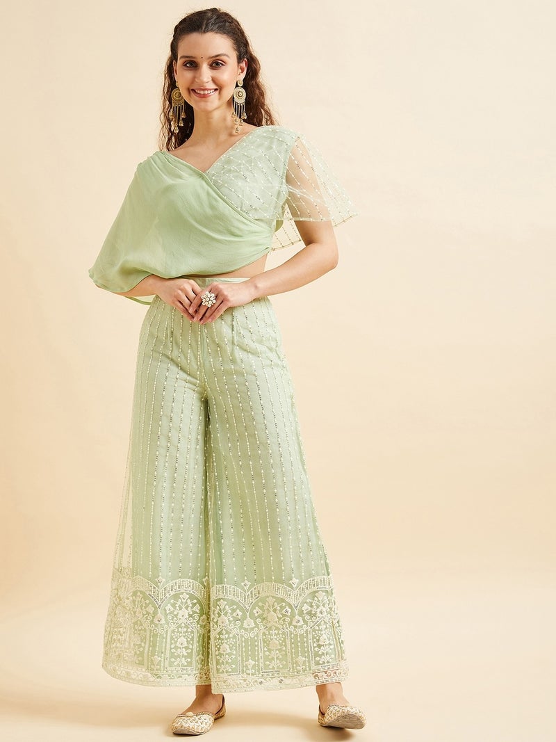 بانيت طقم متناسق (Co-ord Set) بلوزة قصيرة مطرَّزة من قماش الشبك (Net) مع بنطلون بالازو - Image 1