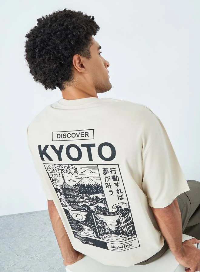 Styli  Men Beige Graphic Print Oversized Jersey T-Shirt for Men | Best Price UAE
