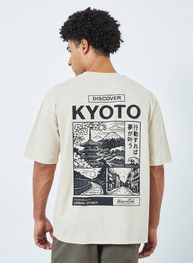 Styli  Men Beige Graphic Print Oversized Jersey T-Shirt for Men | Best Price UAE