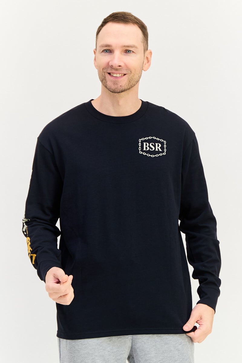 UNDER ARMOUR سويت شيرت خارجي طويل الأكمام فضفاض للرجال، أسود - Image 1