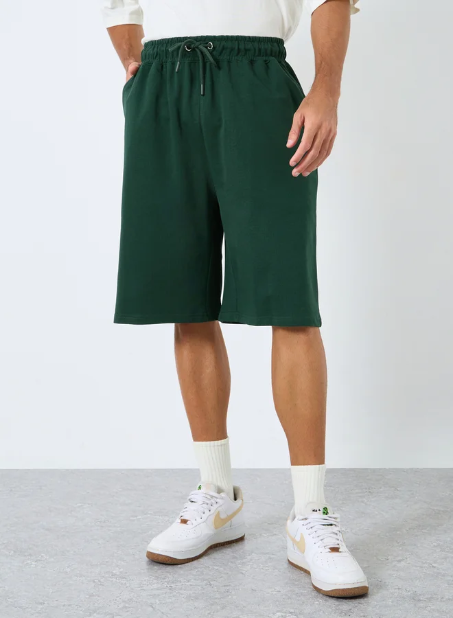 Styli Styli Solid Oversized Shorts with Drawstring