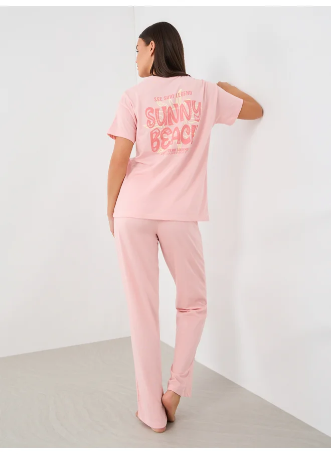 ستايلي Styli Unwind Beach Graphic Pocket Dropped Shoulder T-Shirt and Straight Pyjama Set