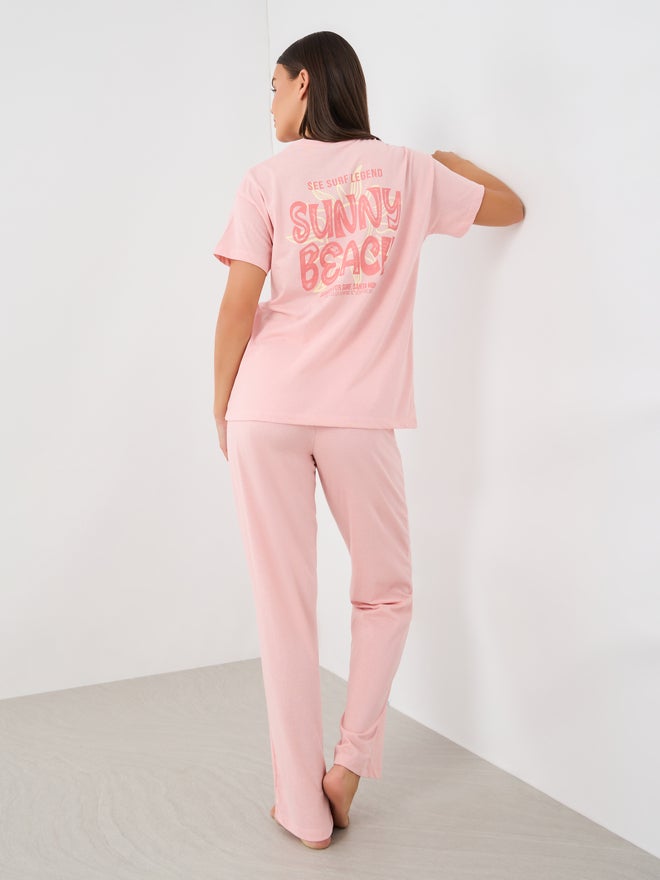 Styli Styli Unwind Beach Graphic Pocket Dropped Shoulder T-Shirt and Straight Pyjama Set  - Image 1
