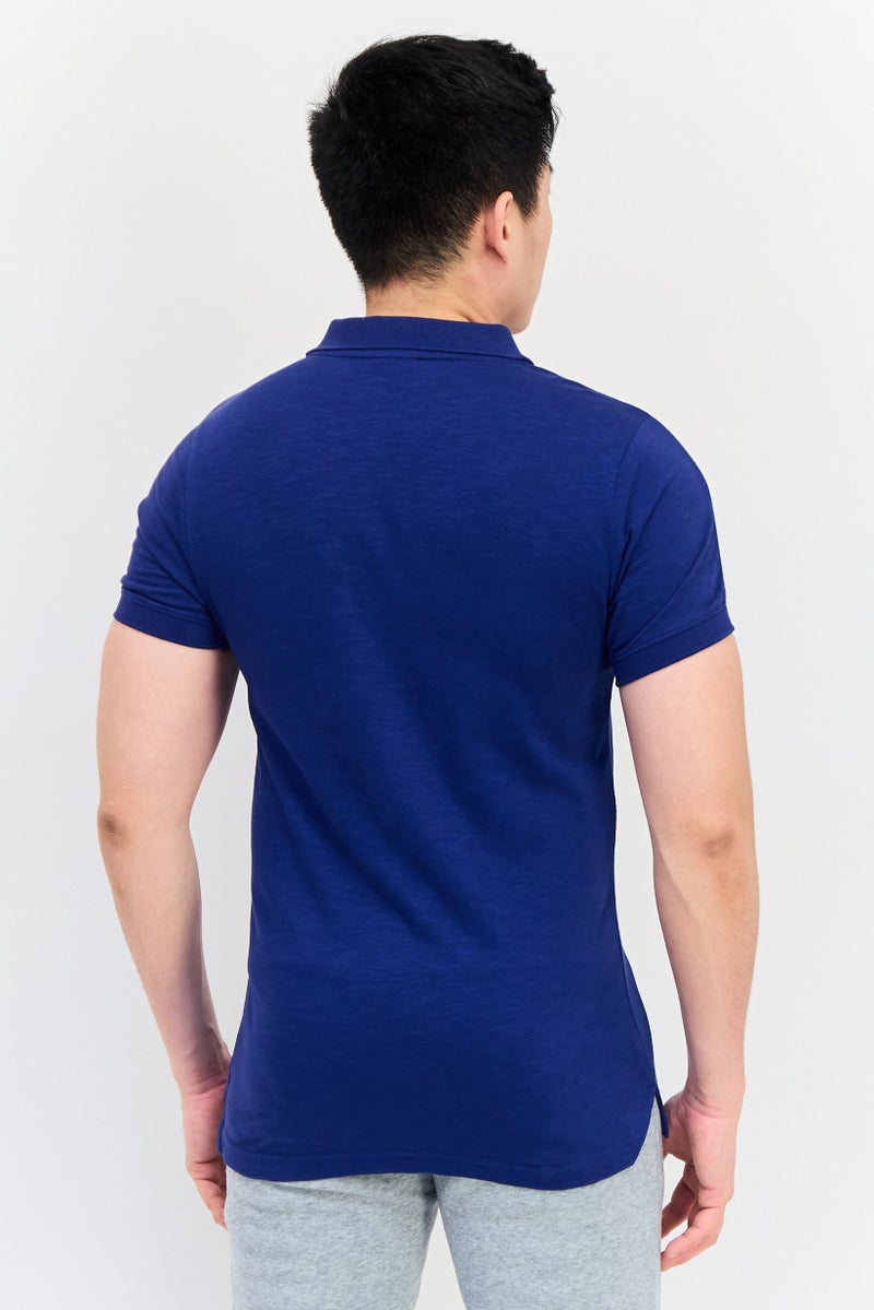 PUMA قميص بولو خارجي للرجال مزين بشعار مطرز، لون كحلي - Image 3