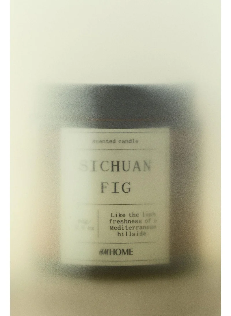 H&M Small scented candle in glass holder