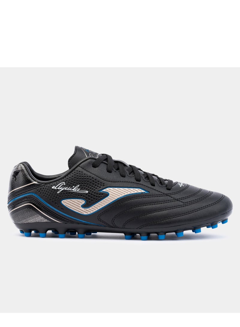 جوما حذاء أغيلا 2301 لكرة القدم من العشب الاصطناعي باللونين الأسود والذهبي - Image 1