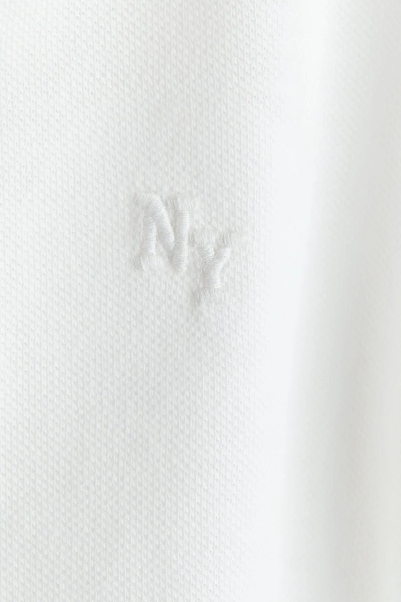 H&M Embroidered-motif piqué polo shirt