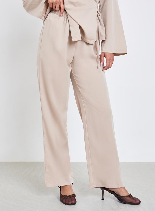 ستايلي طقم منسق من بلوزة لف سادة وبنطال - Image 4