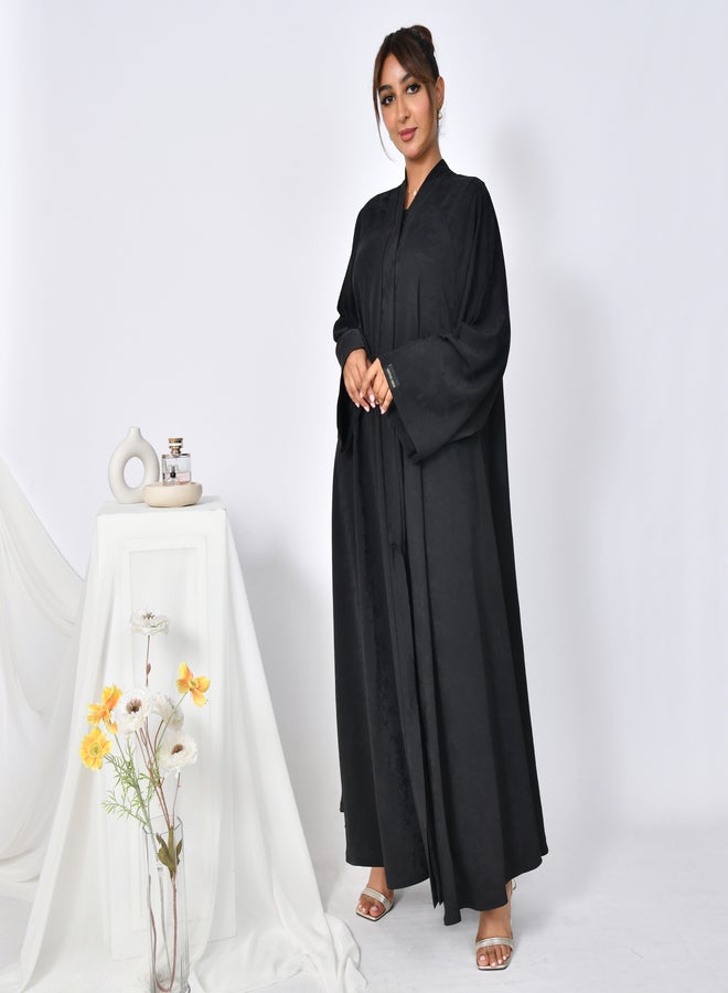 عبايات حوراء عباية سوداء بقصة كلوش مغلقة بطقطق بكم واسع وقماش مشجر - Image 1