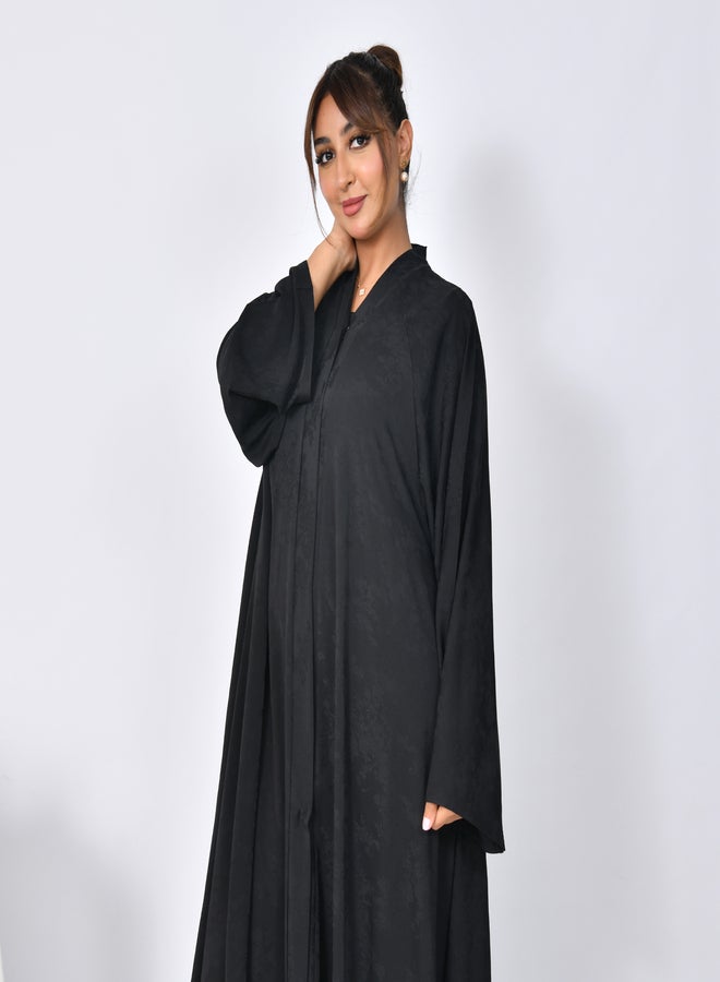 عبايات حوراء عباية سوداء بقصة كلوش مغلقة بطقطق بكم واسع وقماش مشجر - Image 2