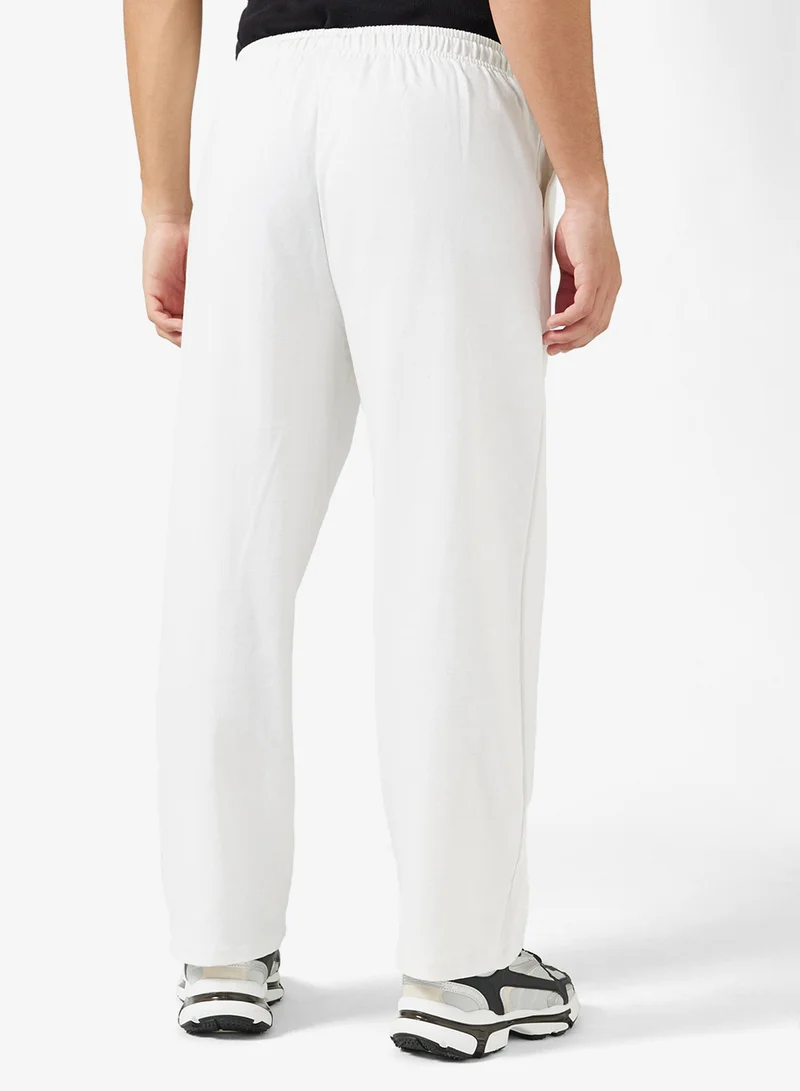 Seventy Five Basics Text Print Open Hem Oversized Joggers