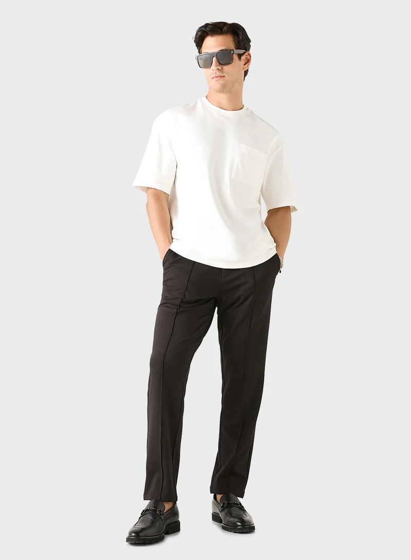 ايكونيك Iconic Solid Slim Fit Trousers with Pockets
