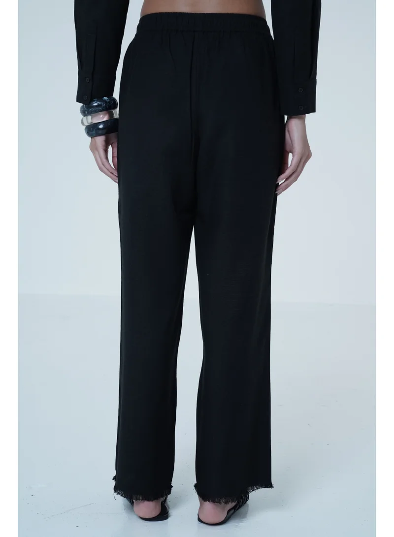 أشيتا فرنانديز Straight-Leg Linen Pants – Black