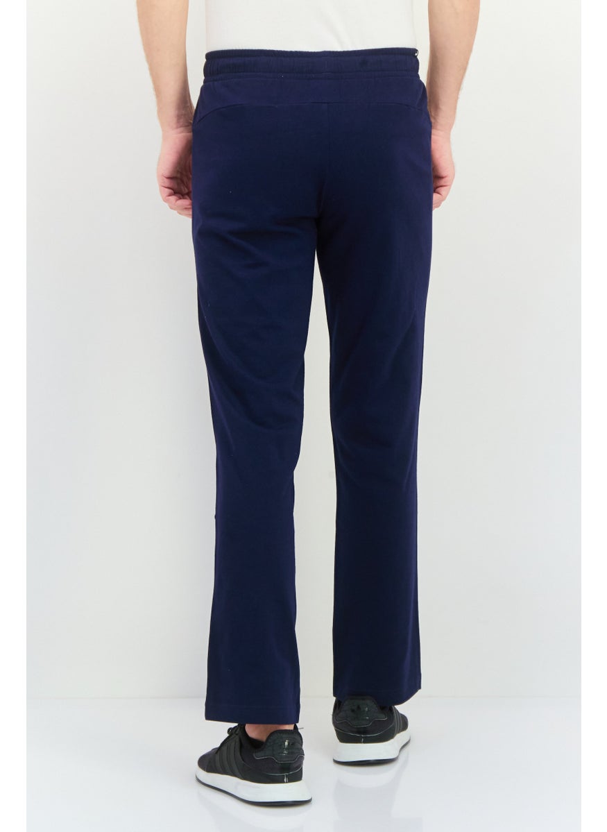 PUMA Men Sportswear Fit Drawstring Outdoor Track Pants, Navy/White  - Image 3