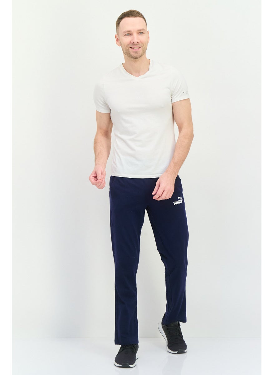 PUMA Men Sportswear Fit Drawstring Outdoor Track Pants, Navy/White  - Image 4