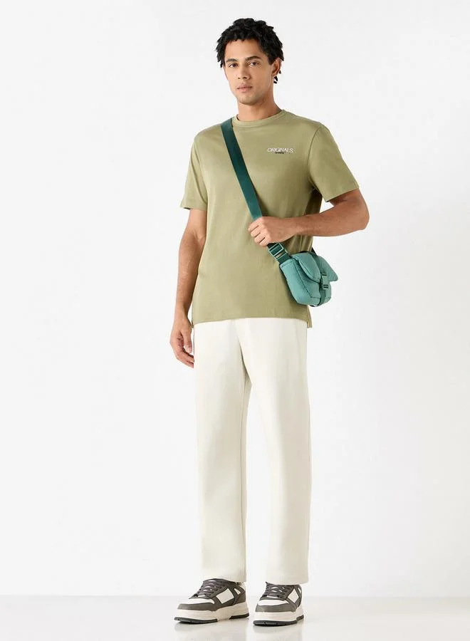 لي كوبر تيشيرت بياقة ضيقة وأكمام قصيرة وطبعات من لي كوبر