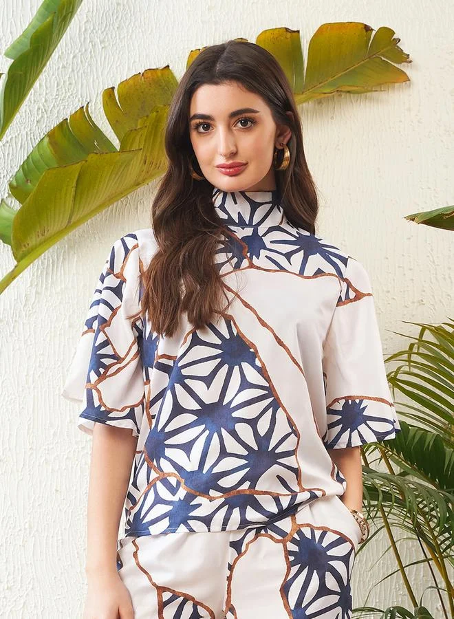 SASSAFRAS Abstract Print High Neck Top with Short Sleeves and Wide Leg Pants Co-Ord