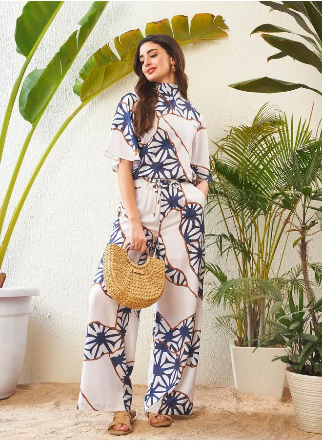 SASSAFRAS Abstract Print High Neck Top with Short Sleeves & Wide Leg Pants Co-Ord by Styli