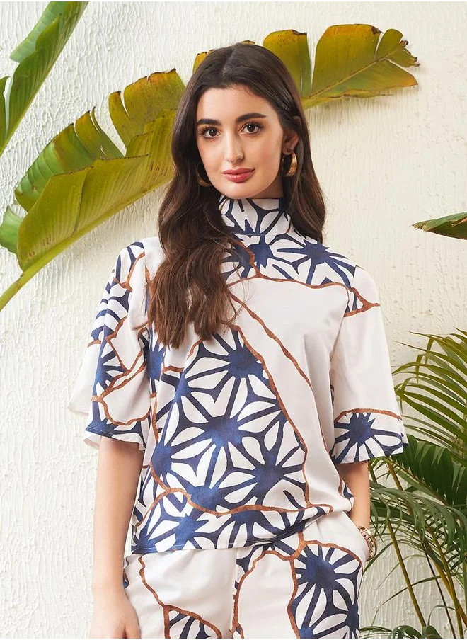 SASSAFRAS Abstract Print High Neck Top with Short Sleeves & Wide Leg Pants Co-Ord by Styli